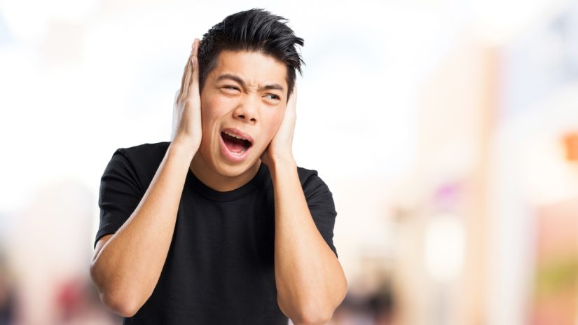 chinese man listening a loud